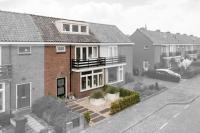 Foto van een aangekochte woning (Maandagsewetering, Noordwijkerhout)
