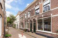 Foto van een aangekochte woning (Houtenstraat, Gouda)