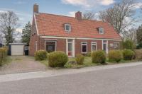 Foto van een aangekochte woning (Meidoornweg, Vriescheloo)
