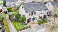Foto van een aangekochte woning (Meester H. Liststraat, Luttelgeest)