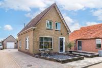 Foto van een aangekochte woning (Schoolkade, Musselkanaal)