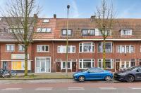 Foto van een aangekochte woning (Burgemeester van Tuyllkade, Utrecht)