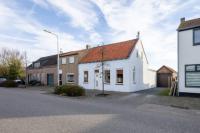 Foto van een aangekochte woning (Zandstraat, Sas van Gent)